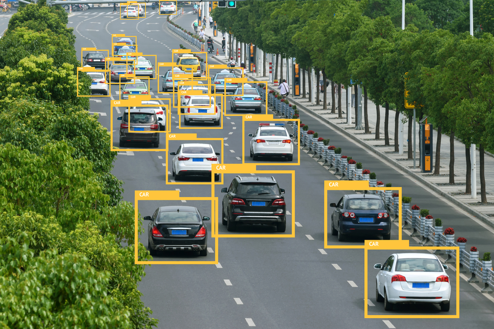 ai detecting cars on road, yellow boxes