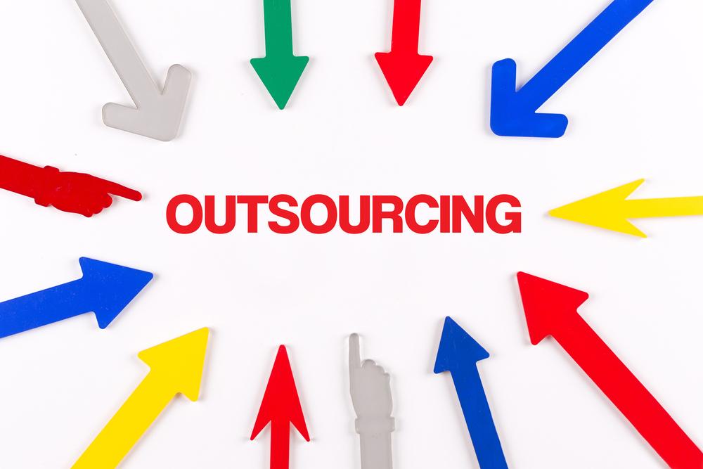 outsourcing written in red on white background, colorful arrows pointing