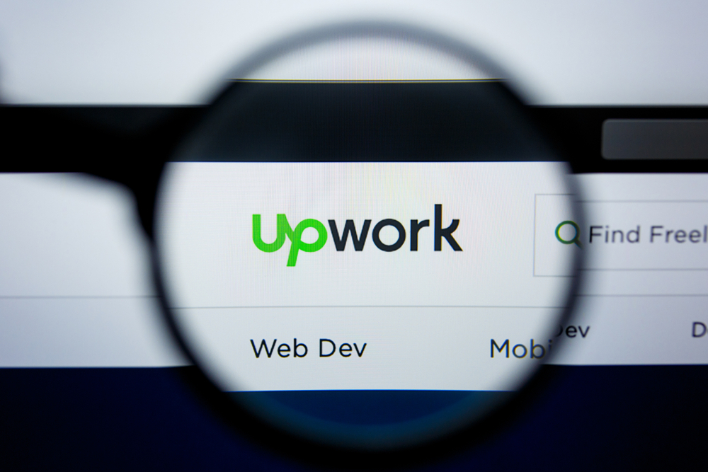 upwork logo suspicious maginify glass - Hire Remote Employees in No Time